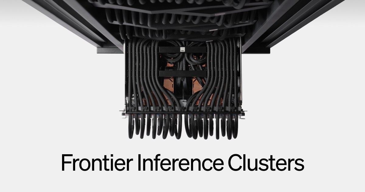 Etched announcement image showing the underside of one of its liquid-cooled inference racks, dense with black coolant hoses and copper cold plates, captioned Frontier Inference Clusters.